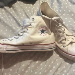 White converse shoes.